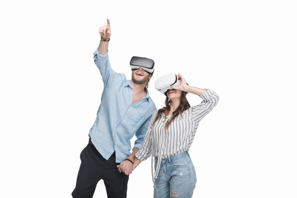 Couple in virtual reality headsets  - Фото, изображение