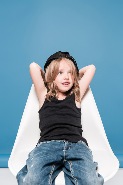 casual kid girl sitting on chair - Photo, image