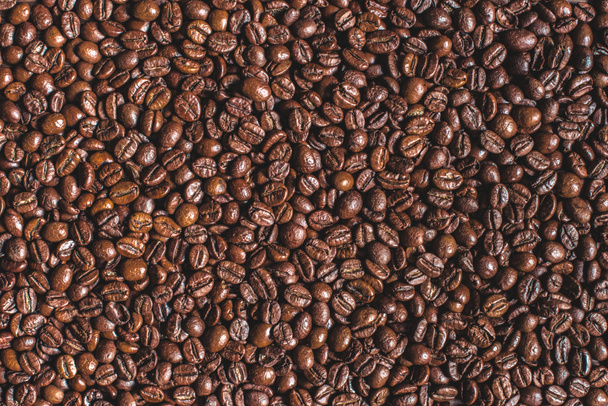 Paahdetut aromaattiset ruskeat kahvipavut
 - Valokuva, kuva