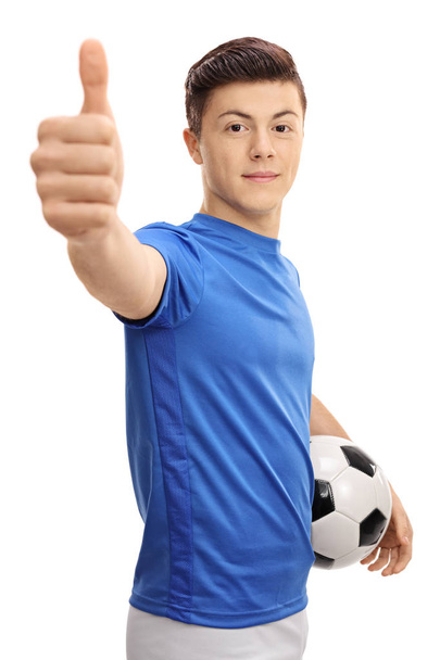 soccer player with football making thumb up gesture - Zdjęcie, obraz