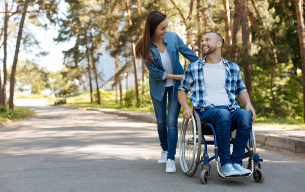 Positive delighted disabled man expressing positivity - Fotografie, Obrázek