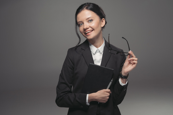 businesswoman holding diary - Fotografie, Obrázek