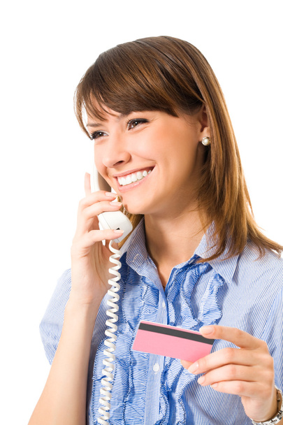 Young happy smiling business woman with plastic card, on phone - Foto, Bild