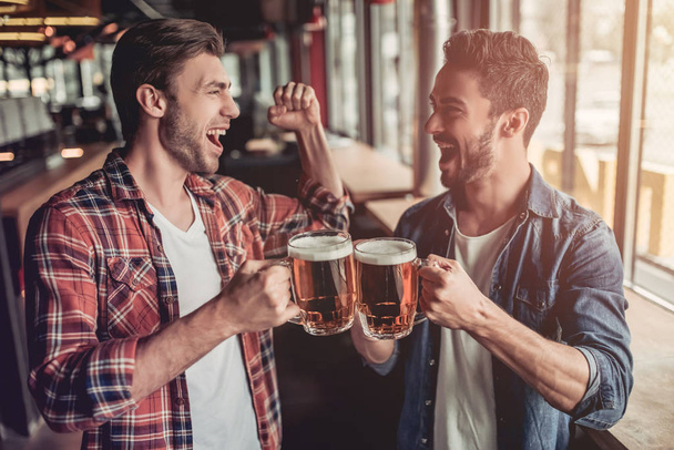 Men in bar - Фото, изображение