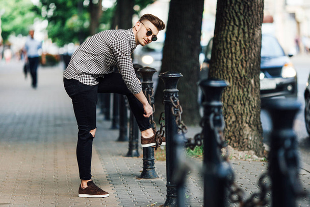 Fashionable man walk outdoors with white background street - Fotografie, Obrázek