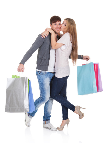 Guy and gal brings shopping bags - Fotografie, Obrázek