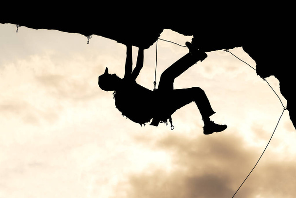 professional rock climber & climber silhouette - Photo, Image