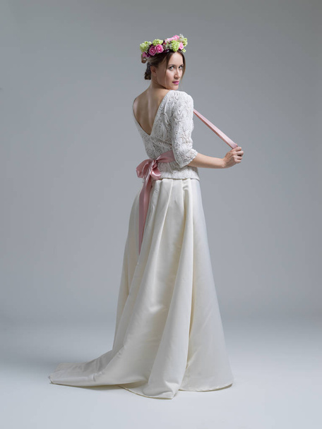 beautiful young woman in wedding dress - Фото, изображение