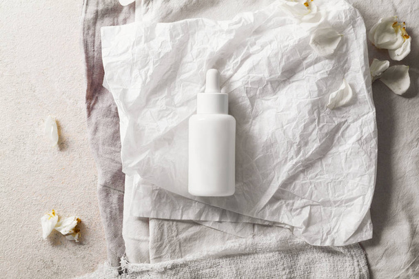 one white cosmetic bottle - Foto, immagini