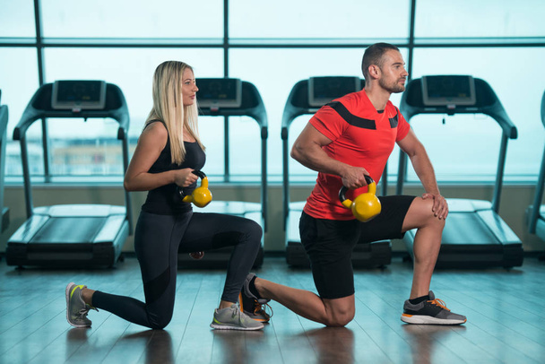 Group Of People Exercise With Kettle Bell - Photo, image