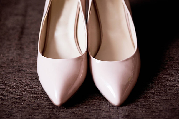 bride's shoes on the sofa - 写真・画像