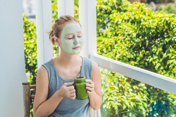 Woman with Facial green clay Mask. - Фото, изображение