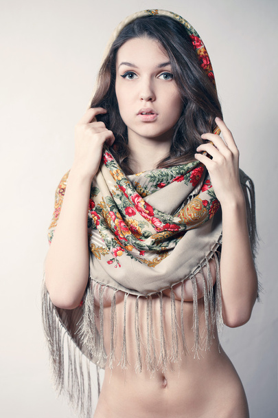 Beautiful naked girl in a beautiful scarf - Photo, Image