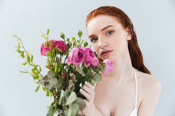 Fashion portrait of a young sensual redheaded woman - Foto, afbeelding