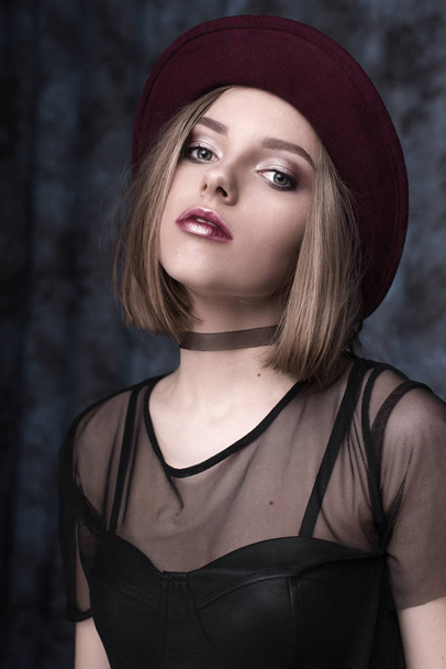 High fashion look, glamor stylish beautiful young woman model with red lips in hipster rock black cloth in boots. Retouched shot - Zdjęcie, obraz