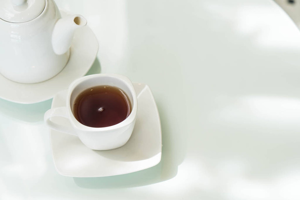 tea cup on the table - Fotoğraf, Görsel