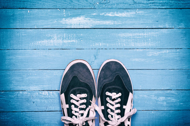 pair of blue male shoes - Фото, изображение