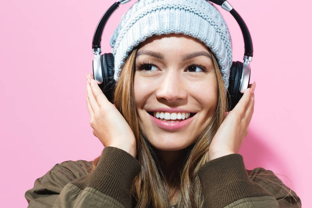 Happy young woman with headphones - Foto, Imagen