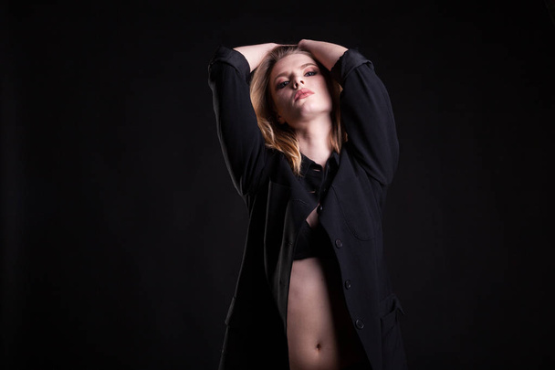 Seductive blonde in casual fashion clothes in studio photo - Fotografie, Obrázek