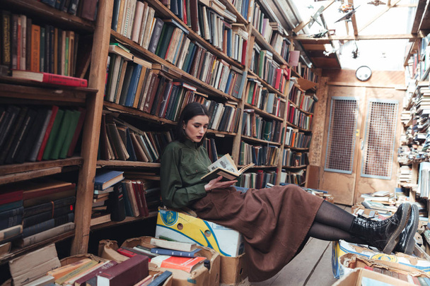 Full-length shot of young woman reading book - Φωτογραφία, εικόνα