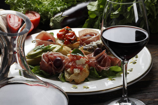 Salad bread and red wine - Photo, image