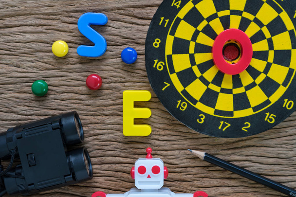 SEO search engine optimization concept with pencil, dartboard, m - Φωτογραφία, εικόνα
