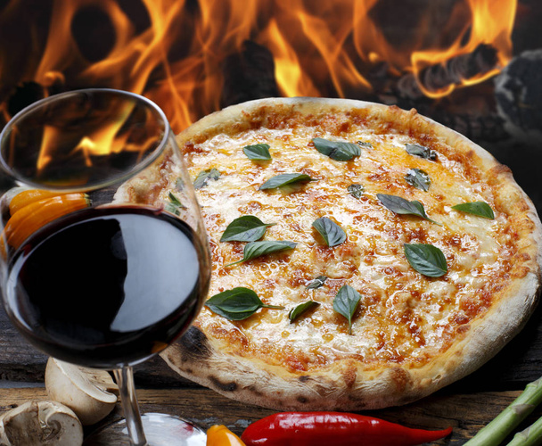 Pizza with glass of red wine - Photo, Image