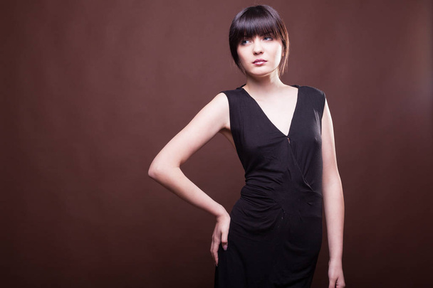 Attractive woman in long black dress - Photo, Image