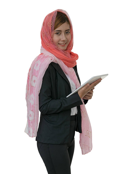 Muslim woman messaging on a mobile phone isolated background wit - Foto, Imagem