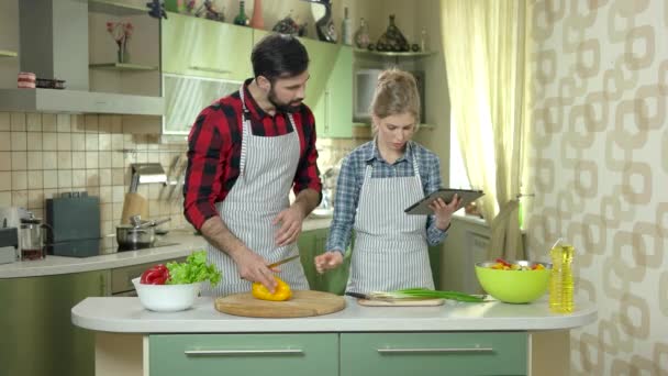Couple with tablet cooking. - Footage, Video