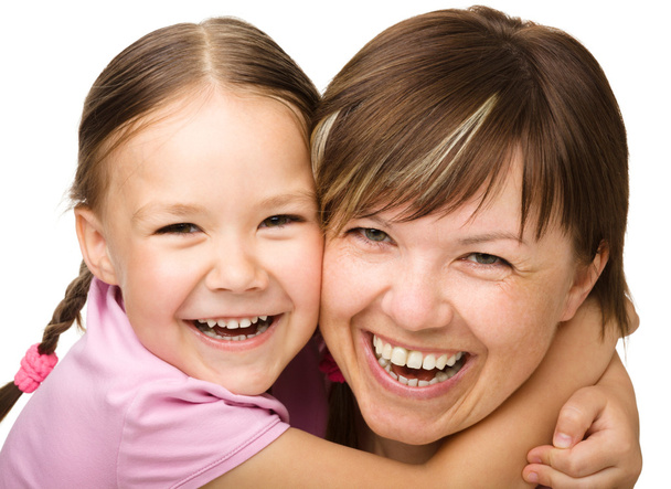 Portrait of a happy mother hugging her daughter - Fotó, kép