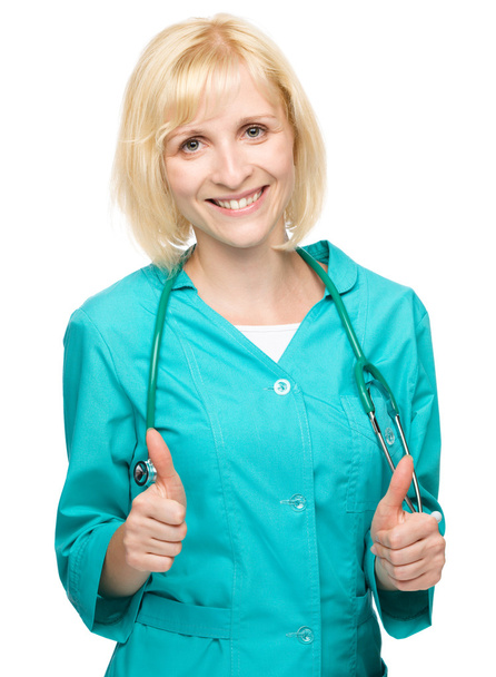 Portrait of a woman wearing doctor uniform - Fotó, kép