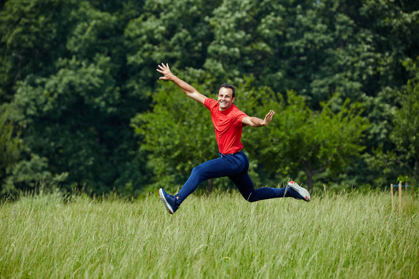 Man jogging and jumping - Photo, Image