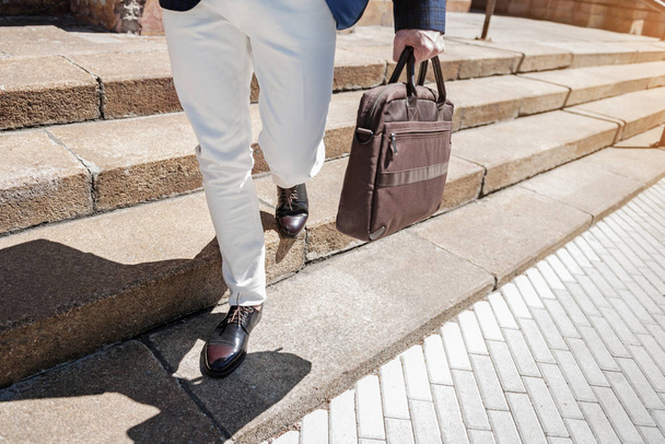Stylish male person carrying handbag - Fotografie, Obrázek