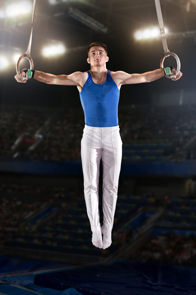 portrait of young man gymnasts - Photo, Image