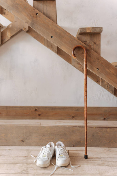 Vertical photo of female shoes standing on wooden floor - Fotografie, Obrázek