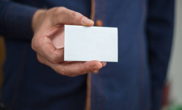 Bank card, business card, businessman holds card in hand, financ - Фото, зображення