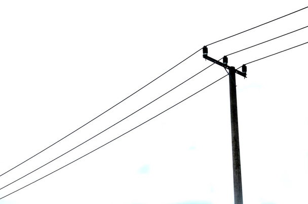 elektrické tyče proti obloze - Fotografie, Obrázek