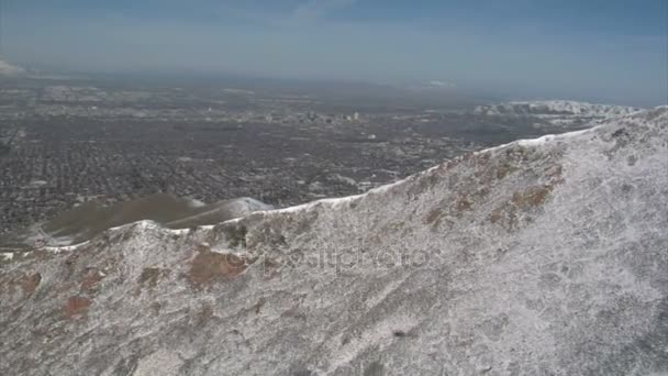 Foto aérea de Salt Lake City y montañas en invierno
 - Imágenes, Vídeo