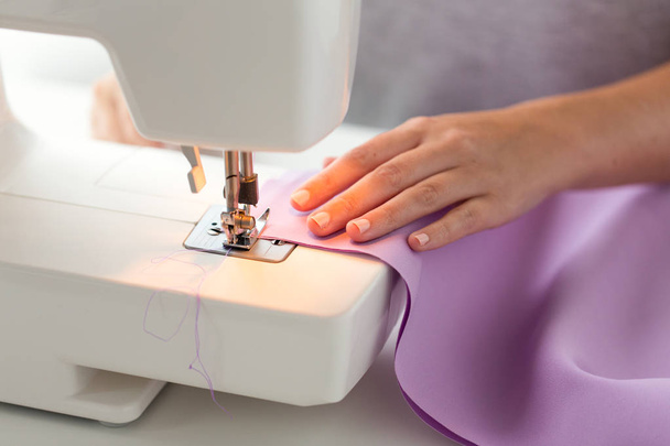 sewing machine presser foot stitching fabric - Фото, изображение