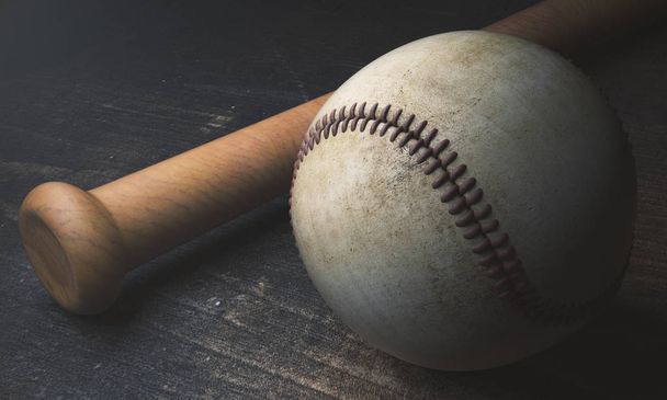 Baseball and bat on wooden surface - 写真・画像