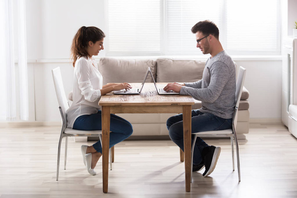 Couple Using Laptops - Photo, image