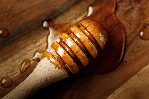 Honey spoon, special wooden dipper - 写真・画像