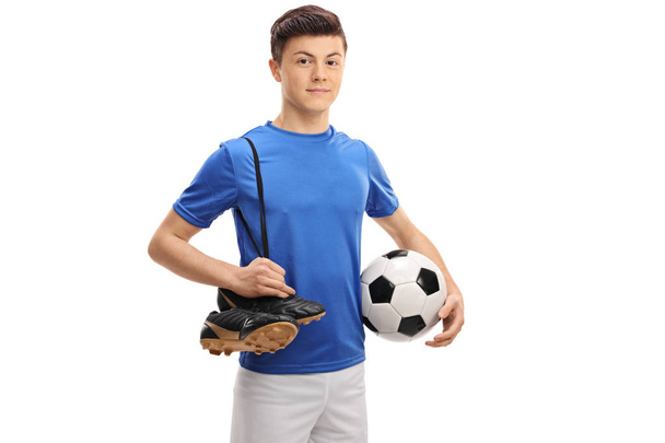 Teenage soccer player with football and soccer shoes - Foto, Bild
