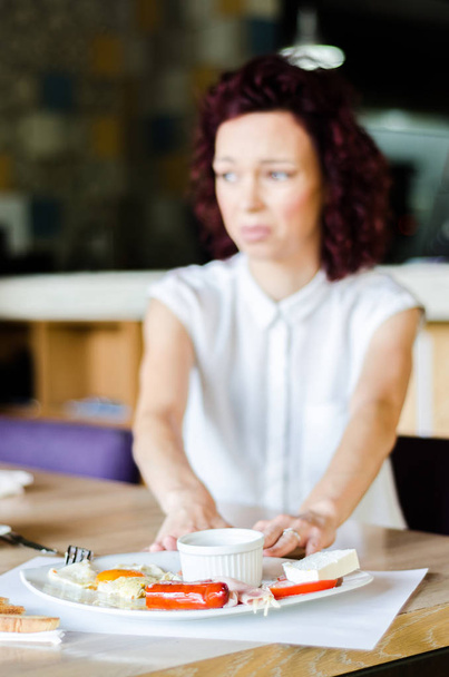 woman rejects food in restaurant  - Foto, immagini