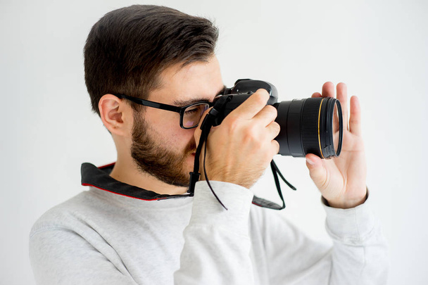 Male photographer with camera - Valokuva, kuva