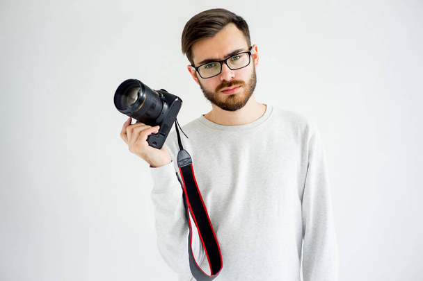 Male photographer with dslr - Fotó, kép