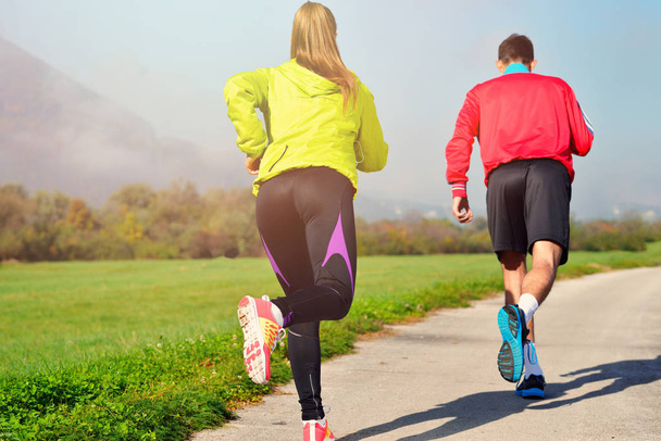 Young couple jogging - Photo, Image