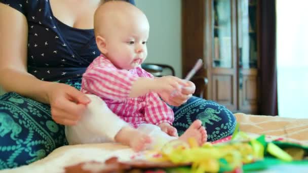 Baby and Mother and Playing with a Toy - Záběry, video