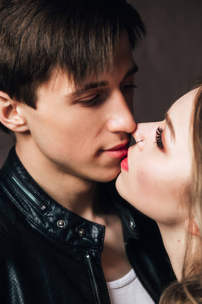 portrait of sexy couple . Beautiful couple touching at each other outdoor - Фото, зображення